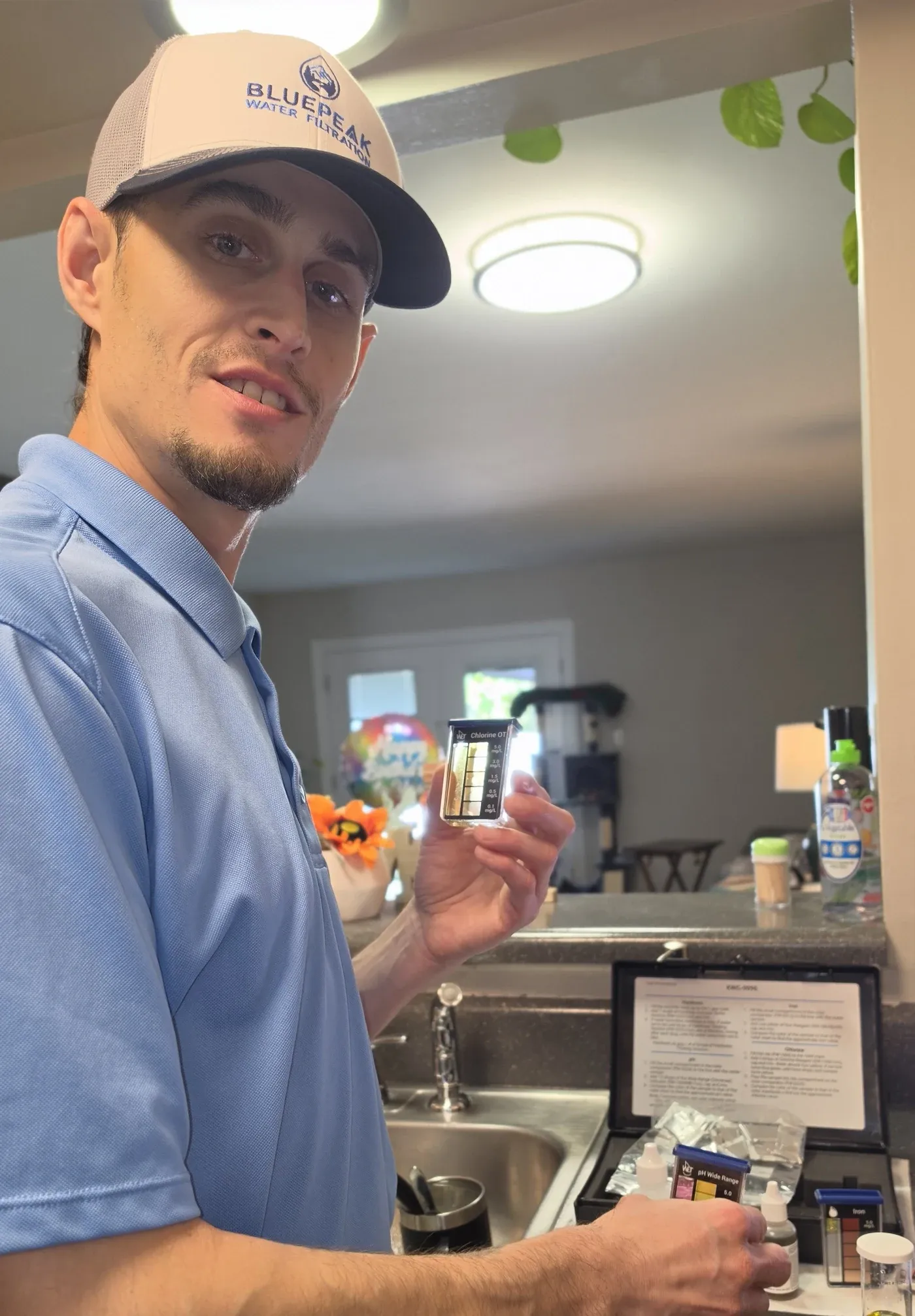 Branden of BluePeak Water Filtration running a free in-home water test
