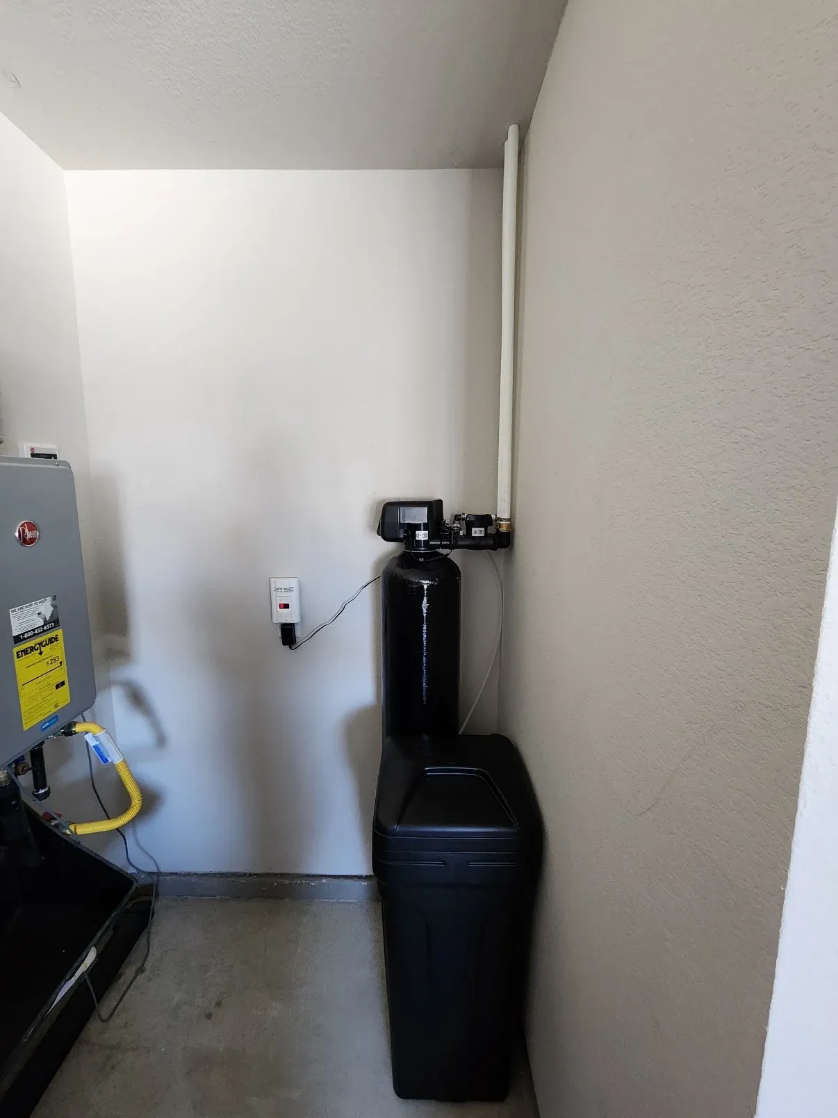 BluePeak Single Tank system with its brine tank, installed in a garage alcove in Raleigh